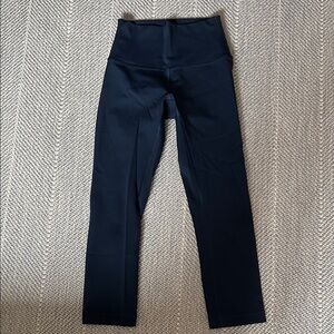 lululemon navy performance leggings with logo tag